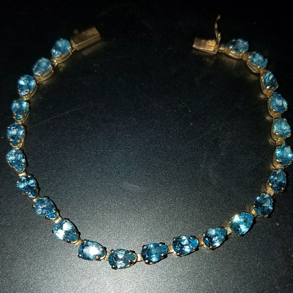 Ocean Bleu 14K Yellow Gold Radiant Cut Blue Topaz Tennis  14k yellow gold blue topaz tennis bracelet